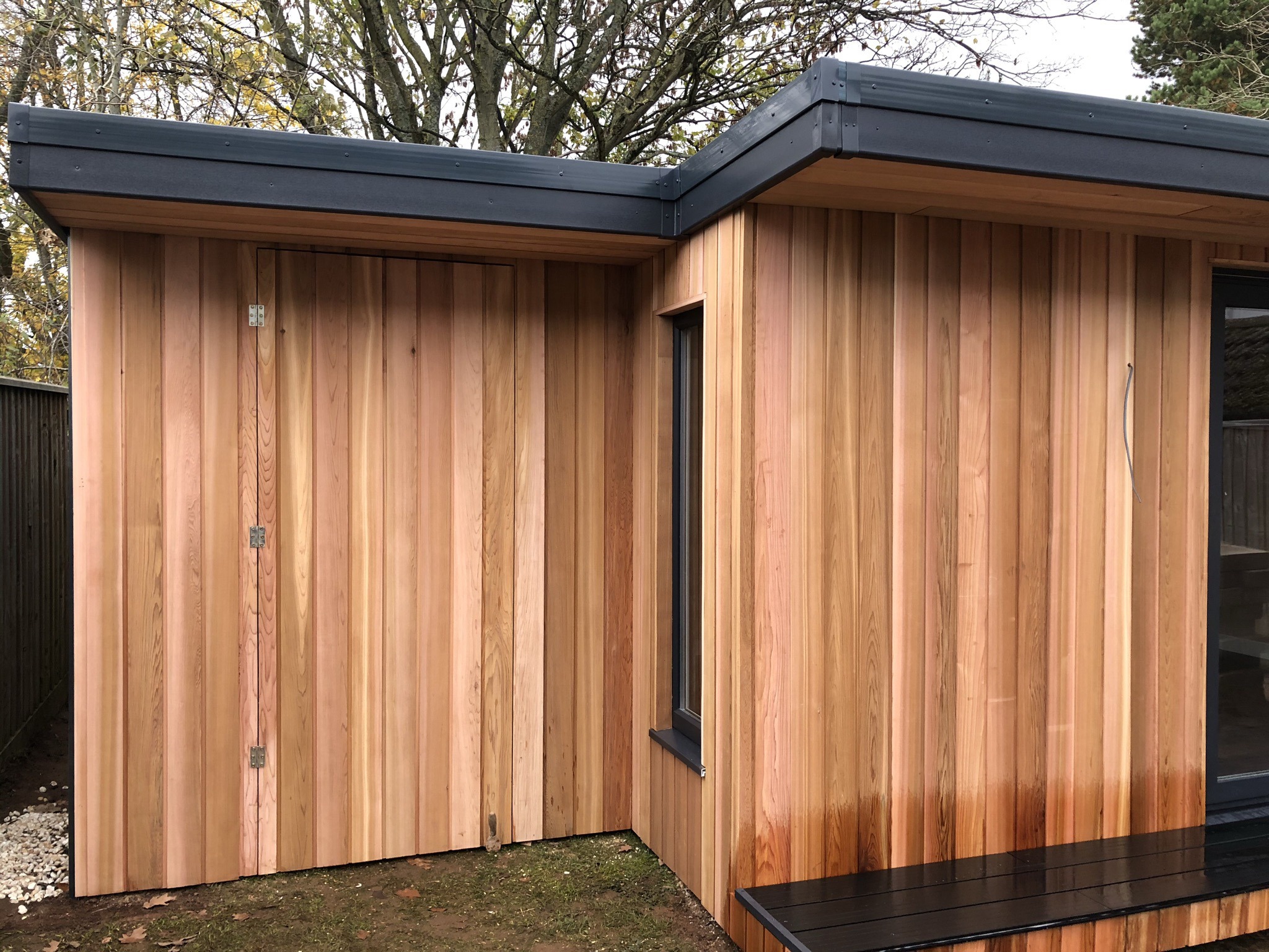 Bristol modified Cotham garden pod with hidden storage room clad in cedar
