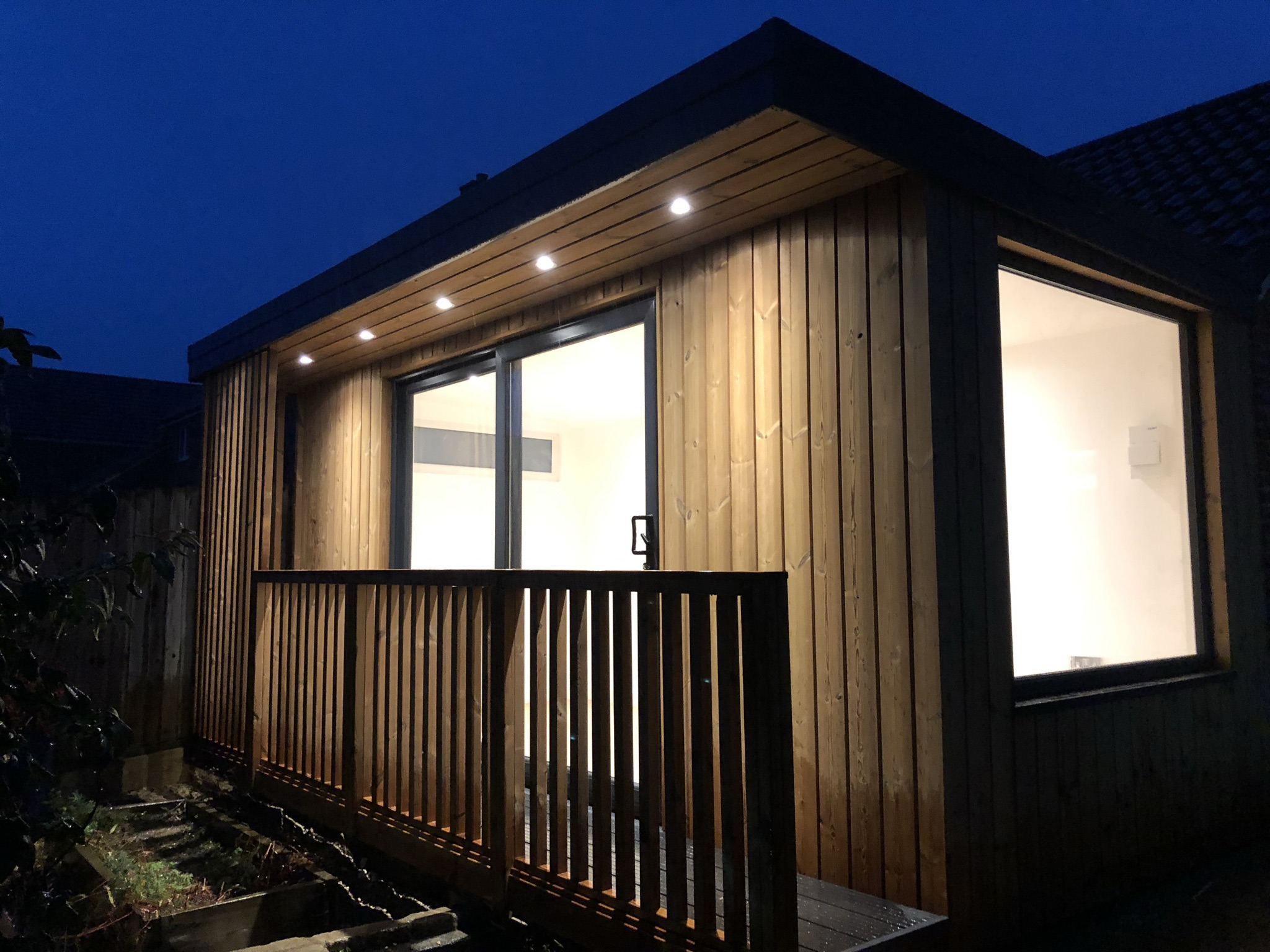 Keynsham modified garden studio with large window and balustrade